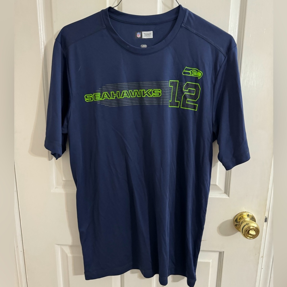 Unisex NFL team apparel. Polyester size large. Fan 12. Seattle Seahawks.